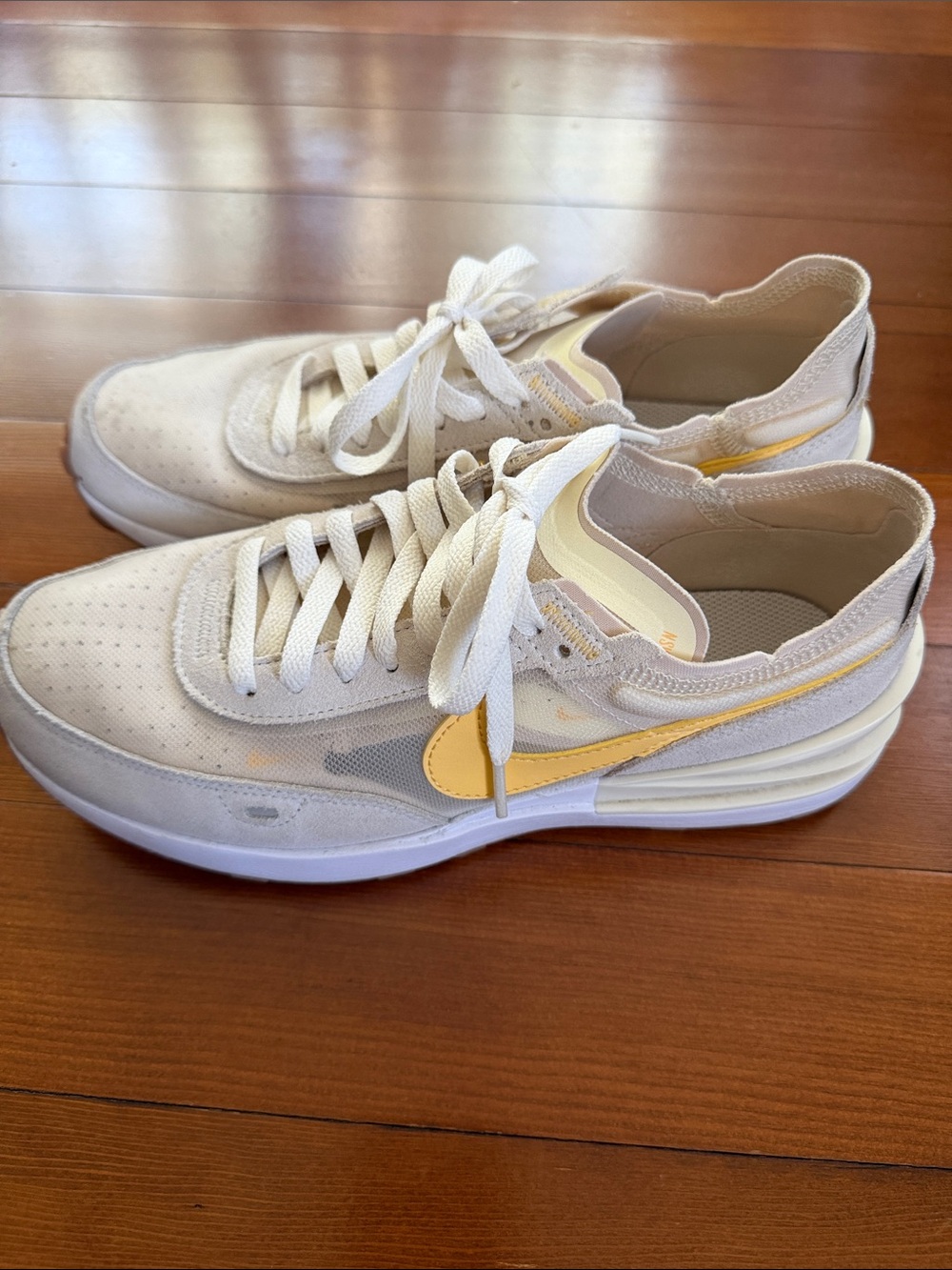 Nike Women's Cream Sneakers with Yellow Swoosh